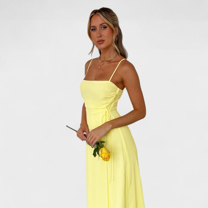 Flossie - Vestido maxi amarelo com laço lateral